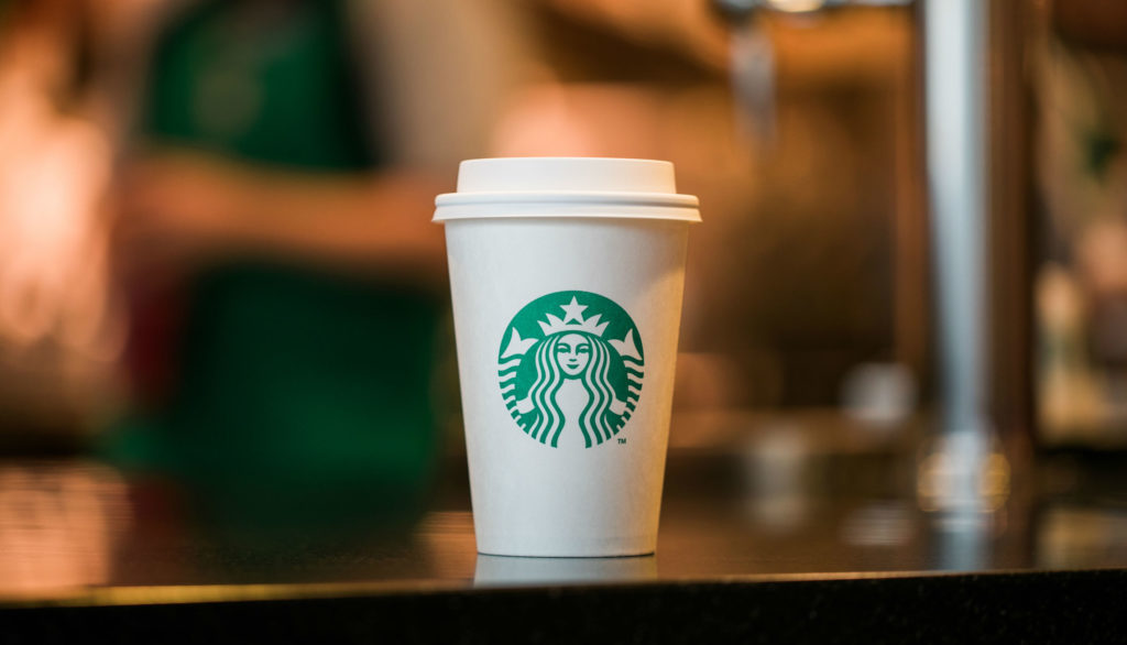 Starbucks / TOP, AFP